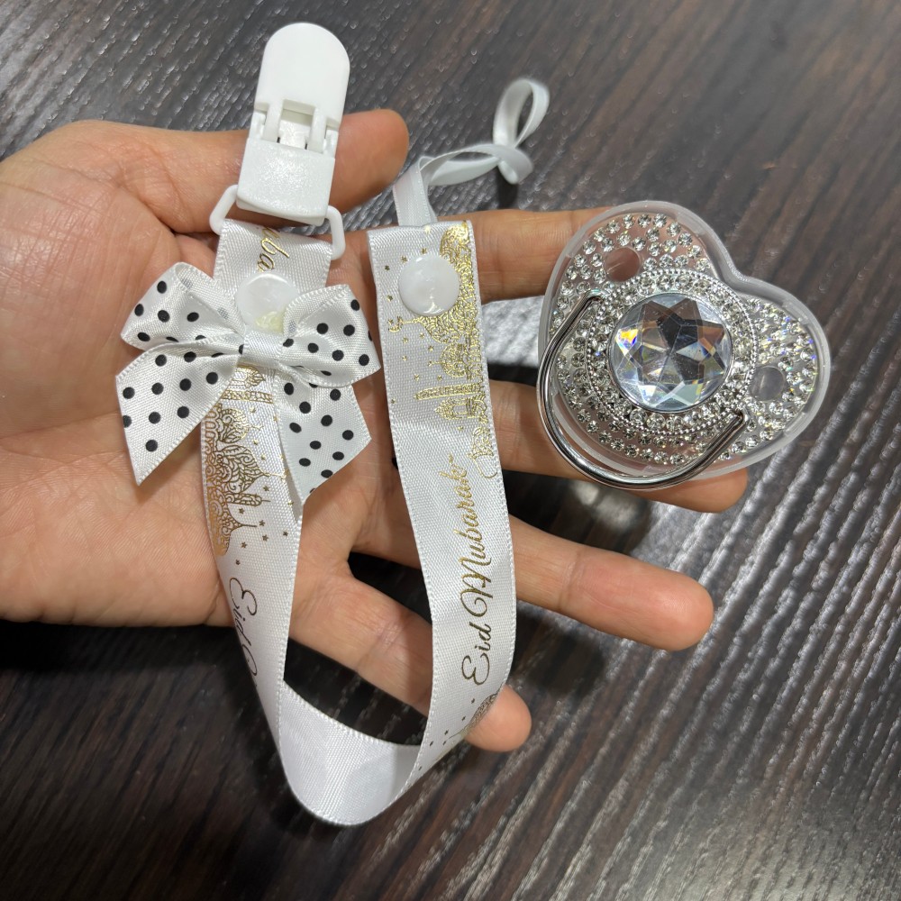 مصاصة ذهبية لامعة للأطفال وحام - مراجعة Newborn Gift Set وسعره