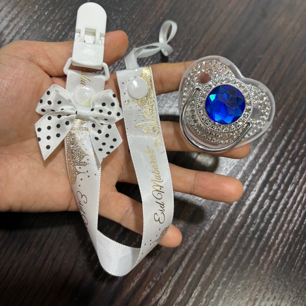 مصاصة ذهبية لامعة للأطفال وحام - مراجعة Newborn Gift Set وسعره