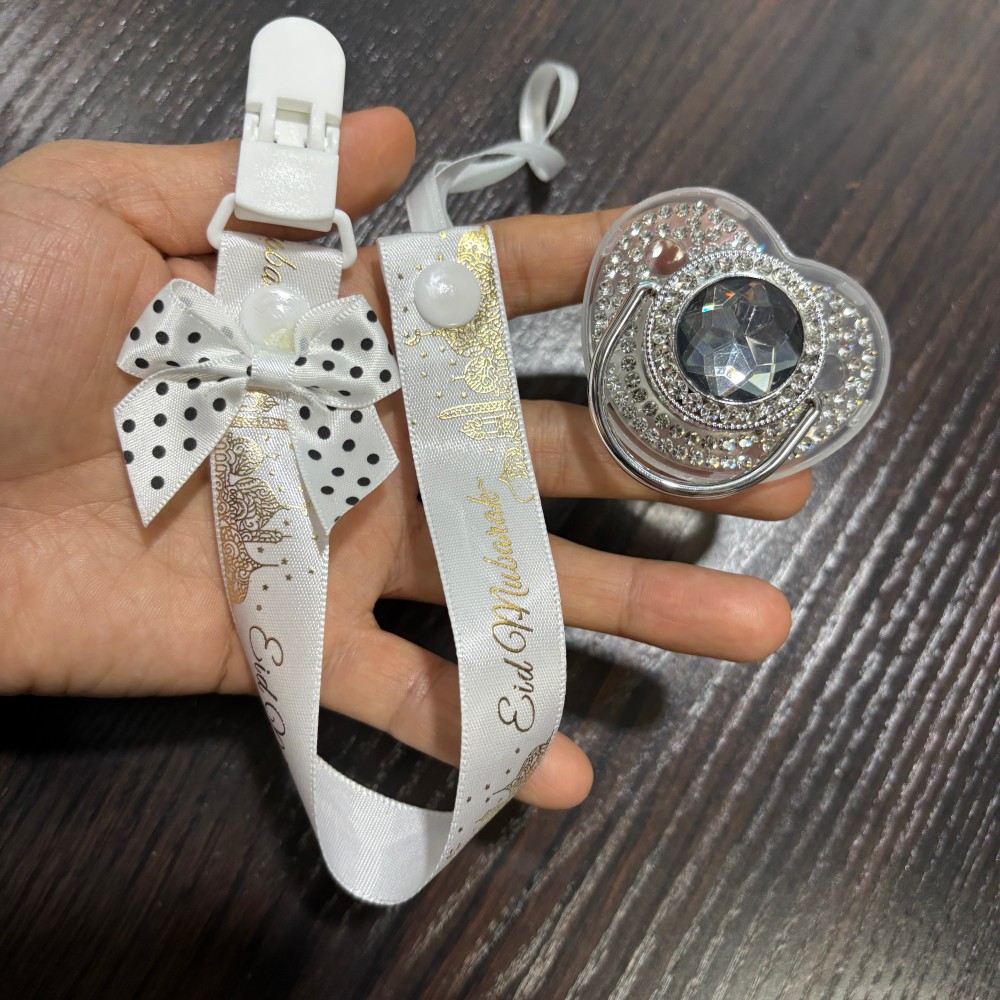 مصاصة ذهبية لامعة للأطفال وحام - مراجعة Newborn Gift Set وسعره