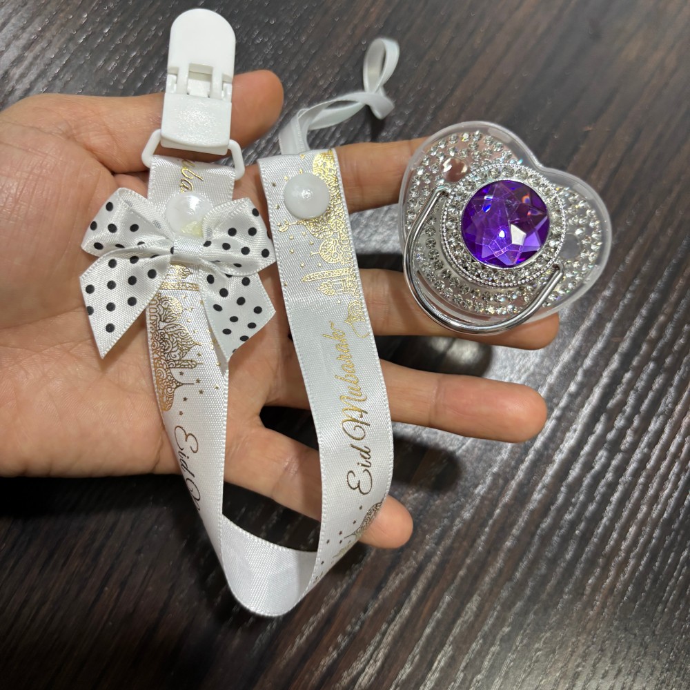 مصاصة ذهبية لامعة للأطفال وحام - مراجعة Newborn Gift Set وسعره